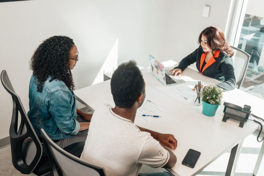 Colleagues working together around a table